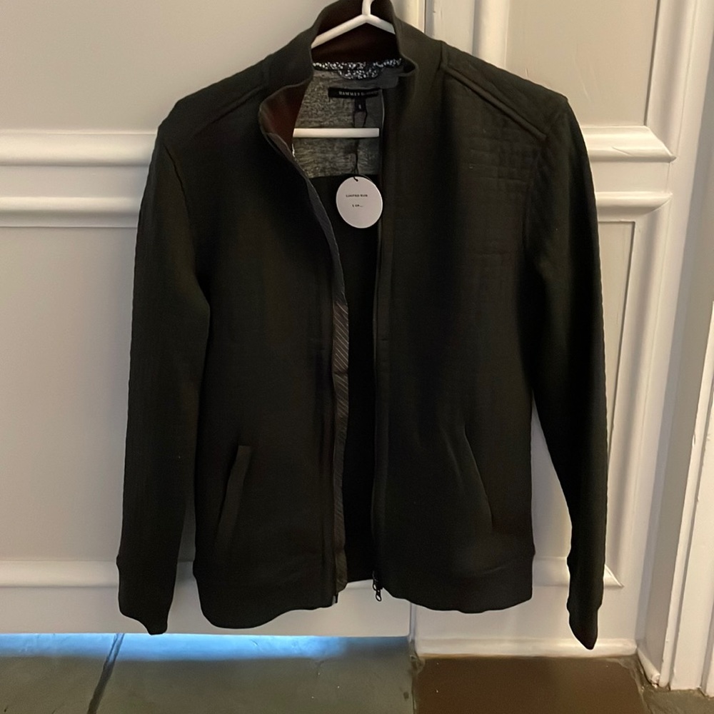 Men’s full zip small sweater. Never worn.
